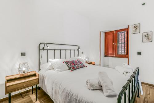 Ένα ή περισσότερα κρεβάτια σε δωμάτιο στο Agaete Modern Holiday Home