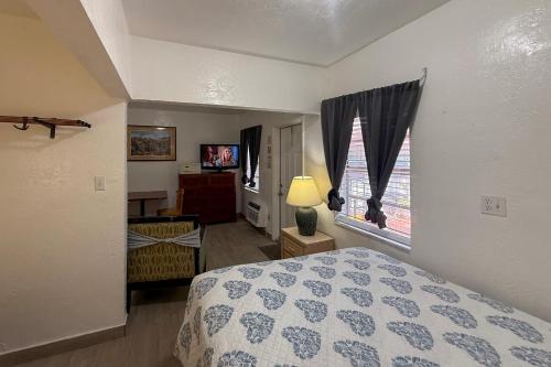 Katil atau katil-katil dalam bilik di Richard's Motel Extended Stay