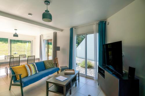 TV a/nebo společenská místnost v ubytování La 745 D'été - Maison au calme proche de la mer