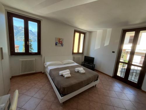 Katil atau katil-katil dalam bilik di Regina Lake Como Condo