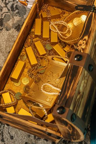 a wooden box filled with gold jewellery at Idou Malabata Beach and SPA in Tangier