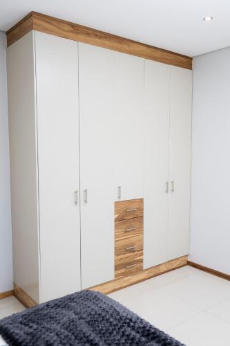 Ένα ή περισσότερα κρεβάτια σε δωμάτιο στο Complete Modern 3-Bedroom Home