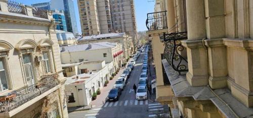 an aerial view of a city street with parked cars at Pilot By Haz Hotel in Baku