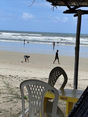 a group of people playing soccer on the beach at Charmoso Village no Povoado de Coqueiros in Jandaíra
