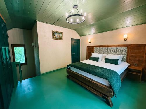 Postel nebo postele na pokoji v ubytování Runaway House - Talistan