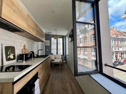 Foto LILLEHOSTS 1, Vieux Lille, Newly renovated, Modern & Stylish apartment, perfectly located 3
