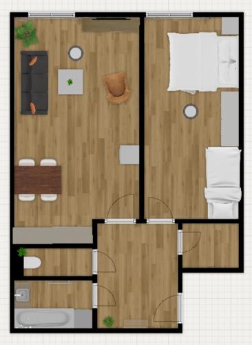 a floor plan of a small room with a table at Apartmán u Fontány 2-free parking in Poděbrady