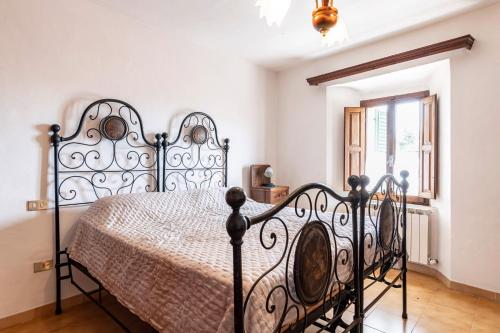 Ένα ή περισσότερα κρεβάτια σε δωμάτιο στο GuestHost - Casa Battazzi