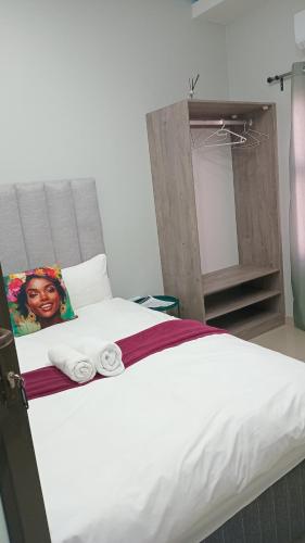 Кровать или кровати в номере Golden View Boutique Guesthouse