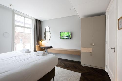 Katil atau katil-katil dalam bilik di Anegang Boutique Hotel