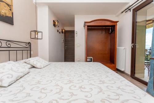 Postel nebo postele na pokoji v ubytování Pentefur Suite Savoca