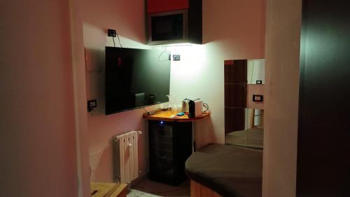 4Roomzにあるキッチンまたは簡易キッチン