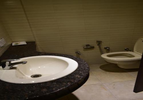 Koupelna v ubytování Hotel Classio Inn