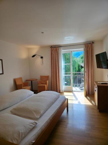 Voodi või voodid majutusasutuse B&B Zur Post toas