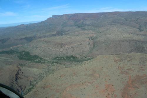 an aerial view of a mountain range from an airplane at Ko Ka Tsara Bush Camp in Beaufort West