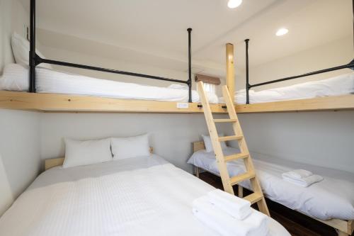 Postel nebo postele na pokoji v ubytování Ocean Stay