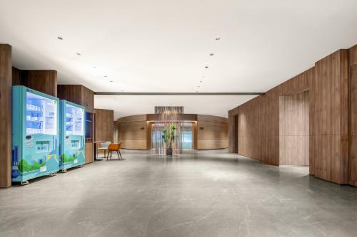 Ο χώρος του λόμπι ή της ρεσεψιόν στο Holiday Inn Express Yibin Xuzhou by IHG