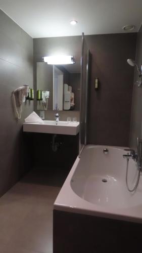 Un baño de Hotel Adagio