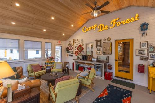 a living room with a sign that reads candy buffet at Camp DeForest in Lincolnville