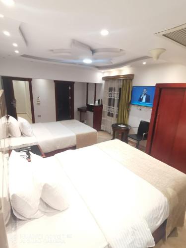 The Nile Palace Hotelにあるベッド