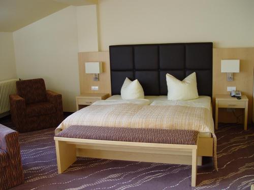 Postel nebo postele na pokoji v ubytování Parkhotel Bad Schandau mit SPA