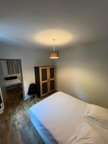 Letto o letti in una camera di Hôtel Le Marintan
