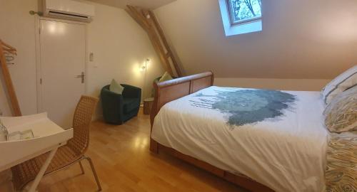 Postel nebo postele na pokoji v ubytování Chambres d'hotes le Matou Roux