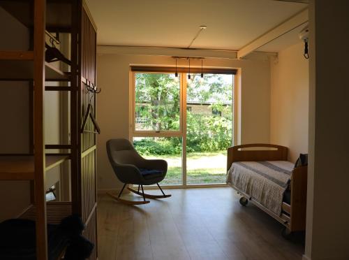 Ένα ή περισσότερα κρεβάτια σε δωμάτιο στο Sleep in close to the S-train