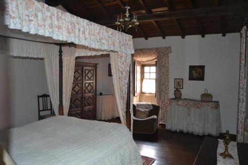Ένα ή περισσότερα κρεβάτια σε δωμάτιο στο Quinta Santa Isabel