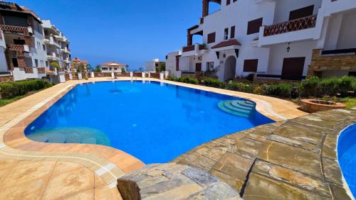 Bazén v ubytování Résidence Al Kassaba, Beach, Pool, Fast Wifi nebo v jeho okolí