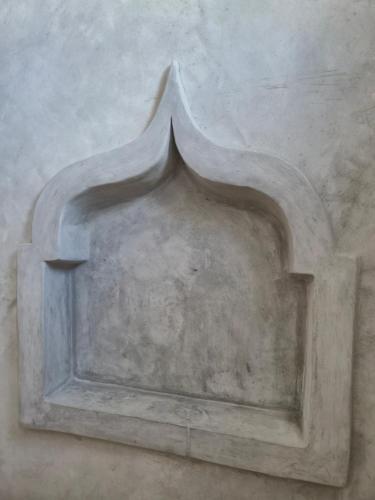 a painting of a niche on a wall at ZamZam House in Jambiani