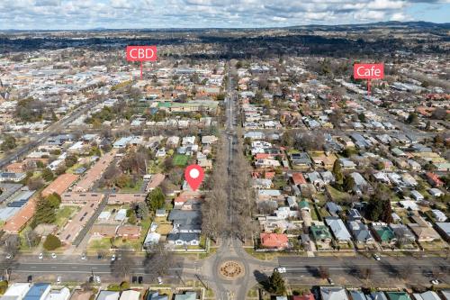 an aerial view of a city with two go signs at Ideal Location, 4 Beds, Mid-Century Home in Orange