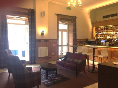 Coin salon dans l'établissement Millennium Hotel Glasgow