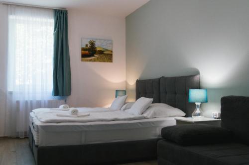 Cama o camas de una habitación en Tó-Part Panzió Kőszeg