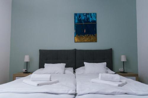 Cama o camas de una habitación en Tó-Part Panzió Kőszeg