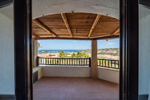 a balcony with a view of the ocean at Villetta nel cuore di Porto Cervo in Porto Cervo