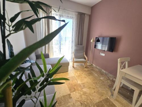 Μια τηλεόραση ή/και κέντρο ψυχαγωγίας στο Vacation at walking distance to the sea