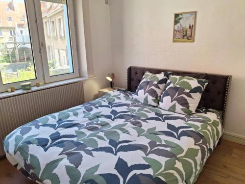 Postel nebo postele na pokoji v ubytování Cosy 50 M2 avec parking privé et vue mer LE PORTEL