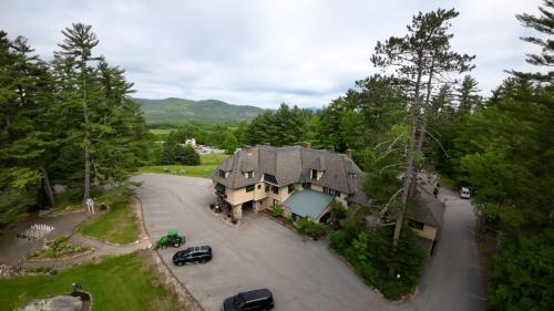 an aerial view of a large house with a driveway at Stonehurst Manor Breakfast & Dinner Included in North Conway