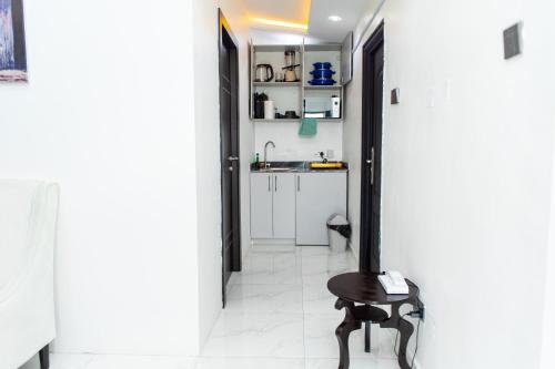 Η κουζίνα ή μικρή κουζίνα στο Havilland Apartments