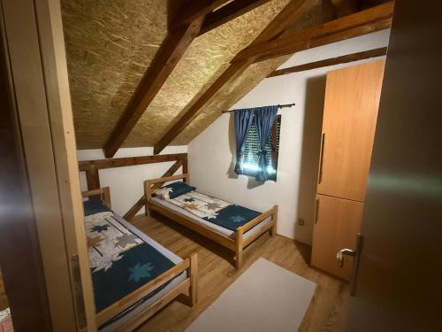 Ένα ή περισσότερα κρεβάτια σε δωμάτιο στο Village Gečat-Villa Una