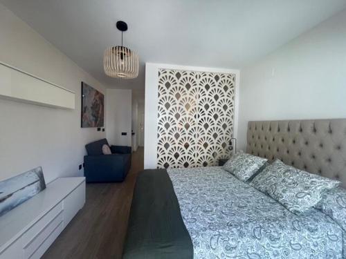 Katil atau katil-katil dalam bilik di Marina Bajondillo Renoved wifi 20 meters from the beach