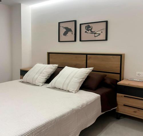 Ένα ή περισσότερα κρεβάτια σε δωμάτιο στο Apartamento Estilo