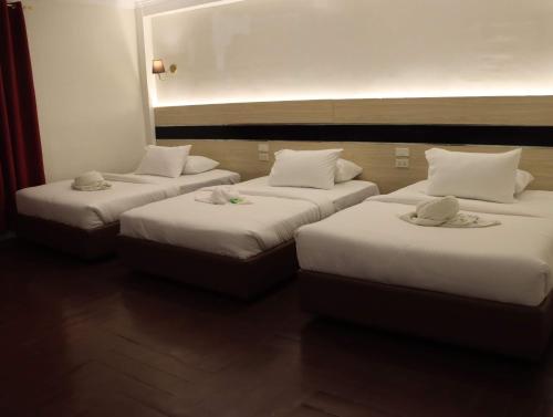 H Mansion Hotelにあるベッド