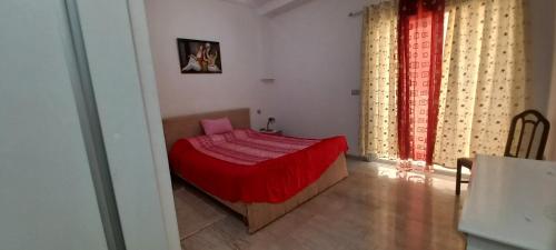 Una cama o camas en una habitación de Dar El Bhar Hammamet