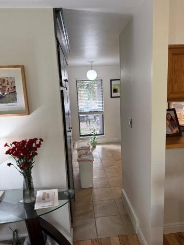 a hallway of a home with a room with a toilet at Foothills of the Rockies in Boulder