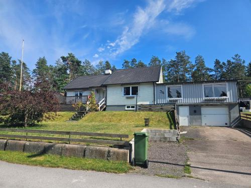a house on the side of a road at Sjönära villa in Oskarshamn