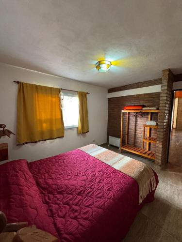 Katil atau katil-katil dalam bilik di Nuestro Chalet