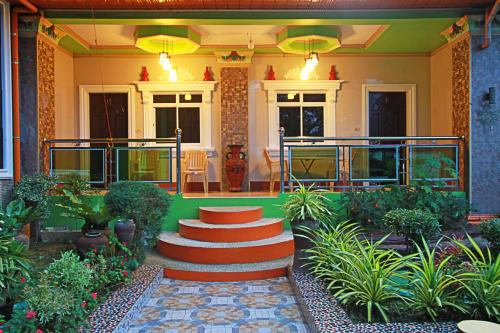 Κήπος έξω από το LobocAirbnb Travellers Inn