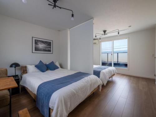 Ένα ή περισσότερα κρεβάτια σε δωμάτιο στο Town House Suma